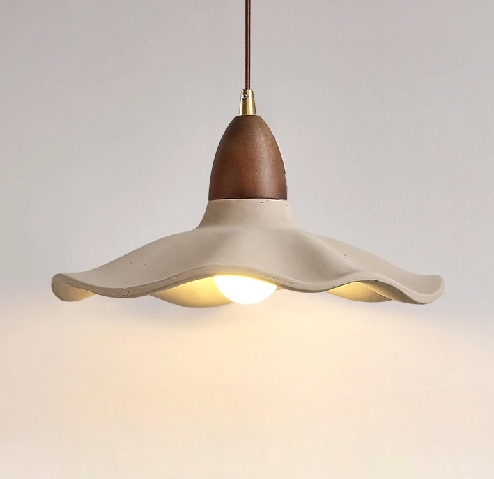 Pendant light with wavy design on a neutral background