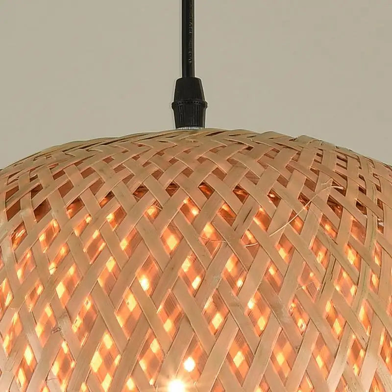Woven bamboo lampshade with a textured surface on a neutral background