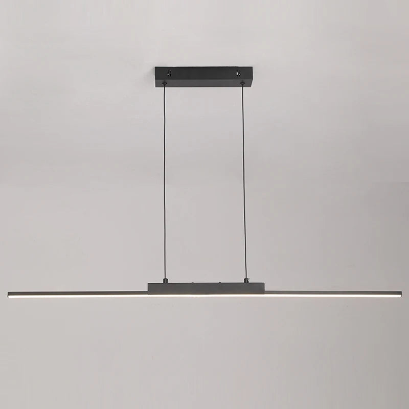 Modern pendant light fixture on a grey background