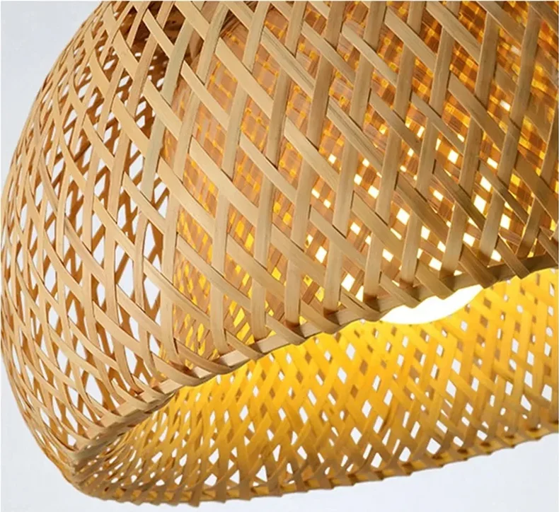 Close-up of a woven bamboo pendant light with a textured surface on a light background