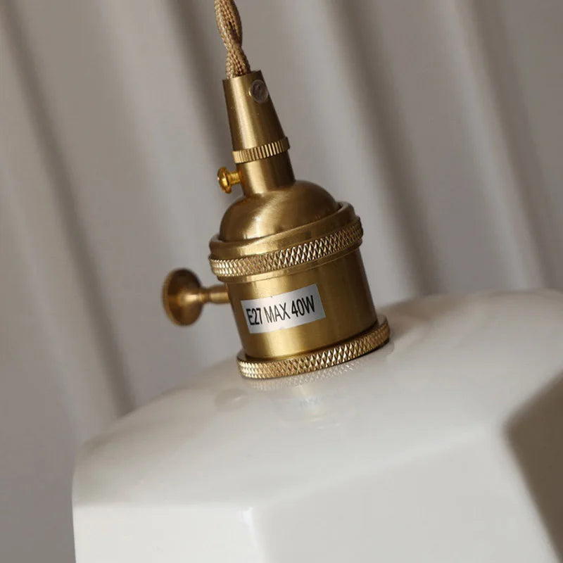 Brass lamp socket on a white background