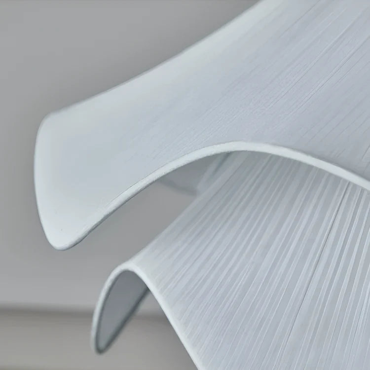 Close-up of a white textured surface with a soft focus background